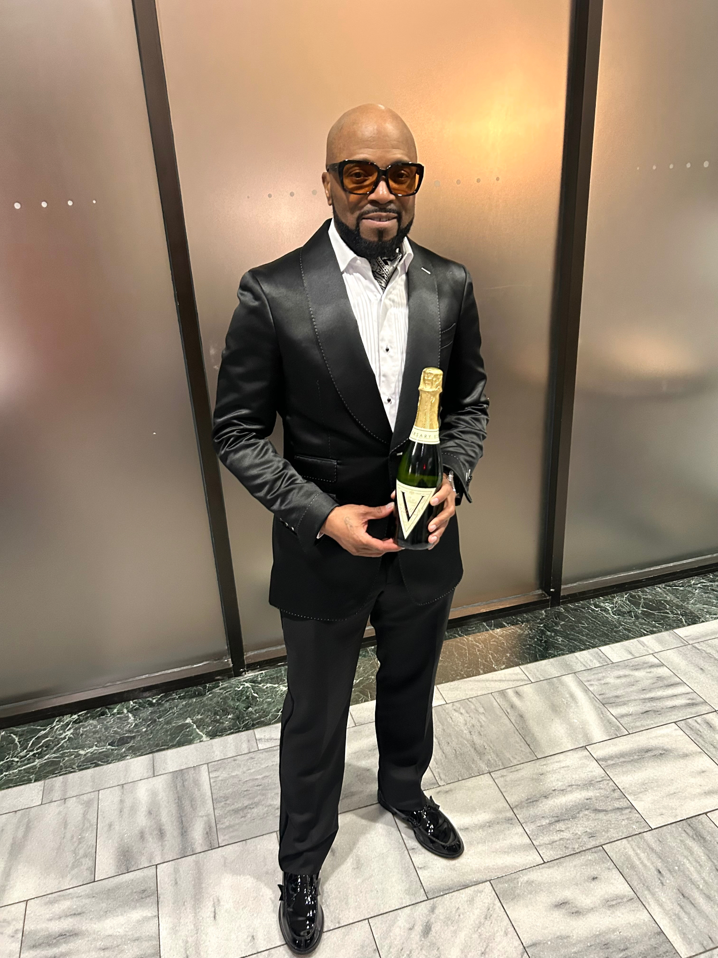 Willie V. Grandeur, proprietor, holding the Brut Delicacy cuvée